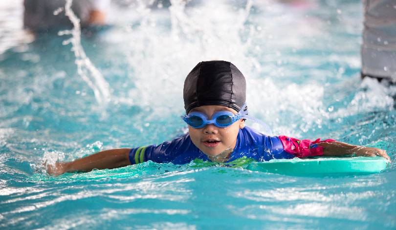 Swimming –  A Springboard for Fitness, Playfulness, and Camaraderie in Children’s Development